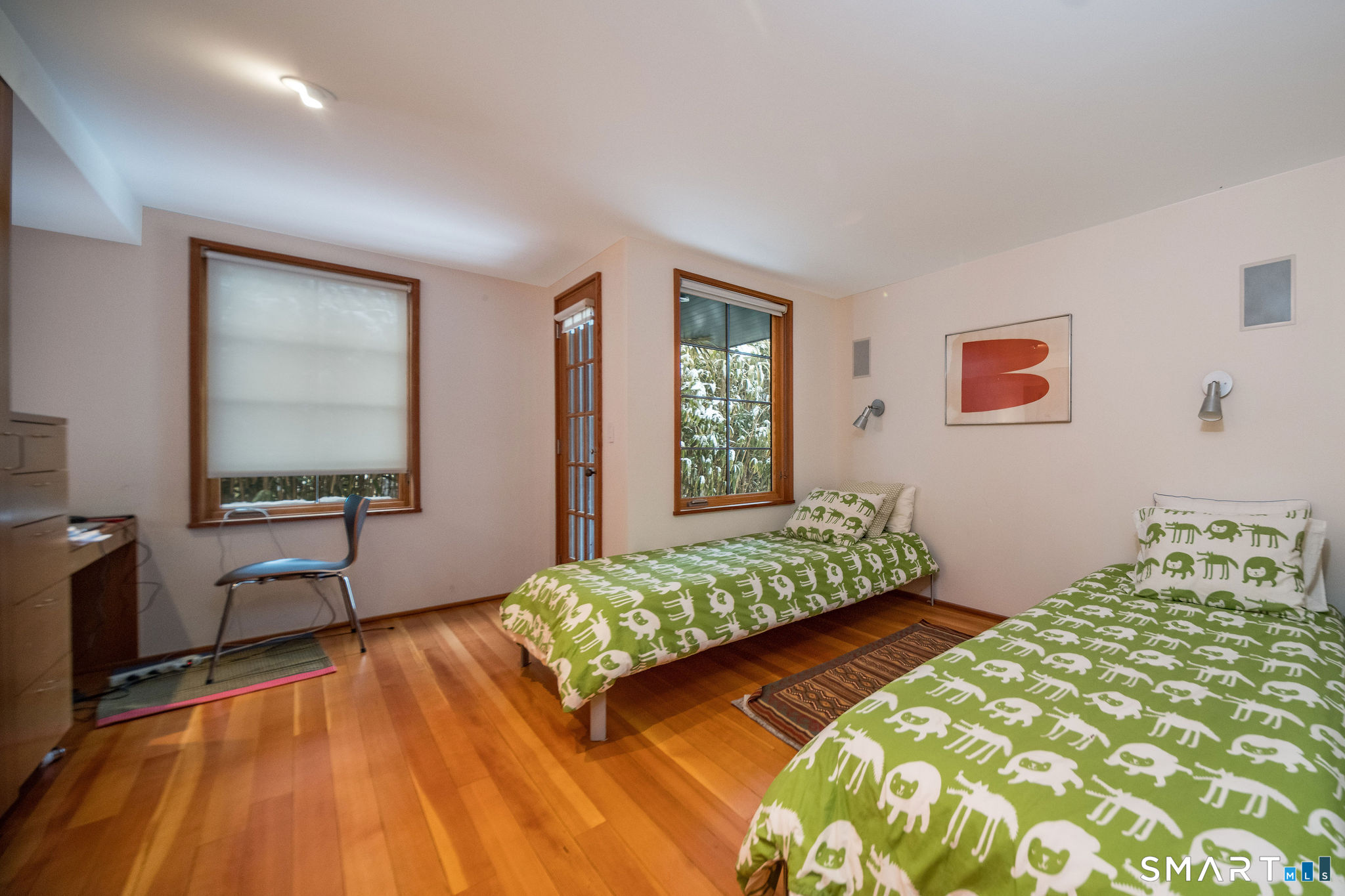 61 Hartford Avenue Madison, CT 06443 - Photo 68 of 75 a bedroom with 2 bed and a window