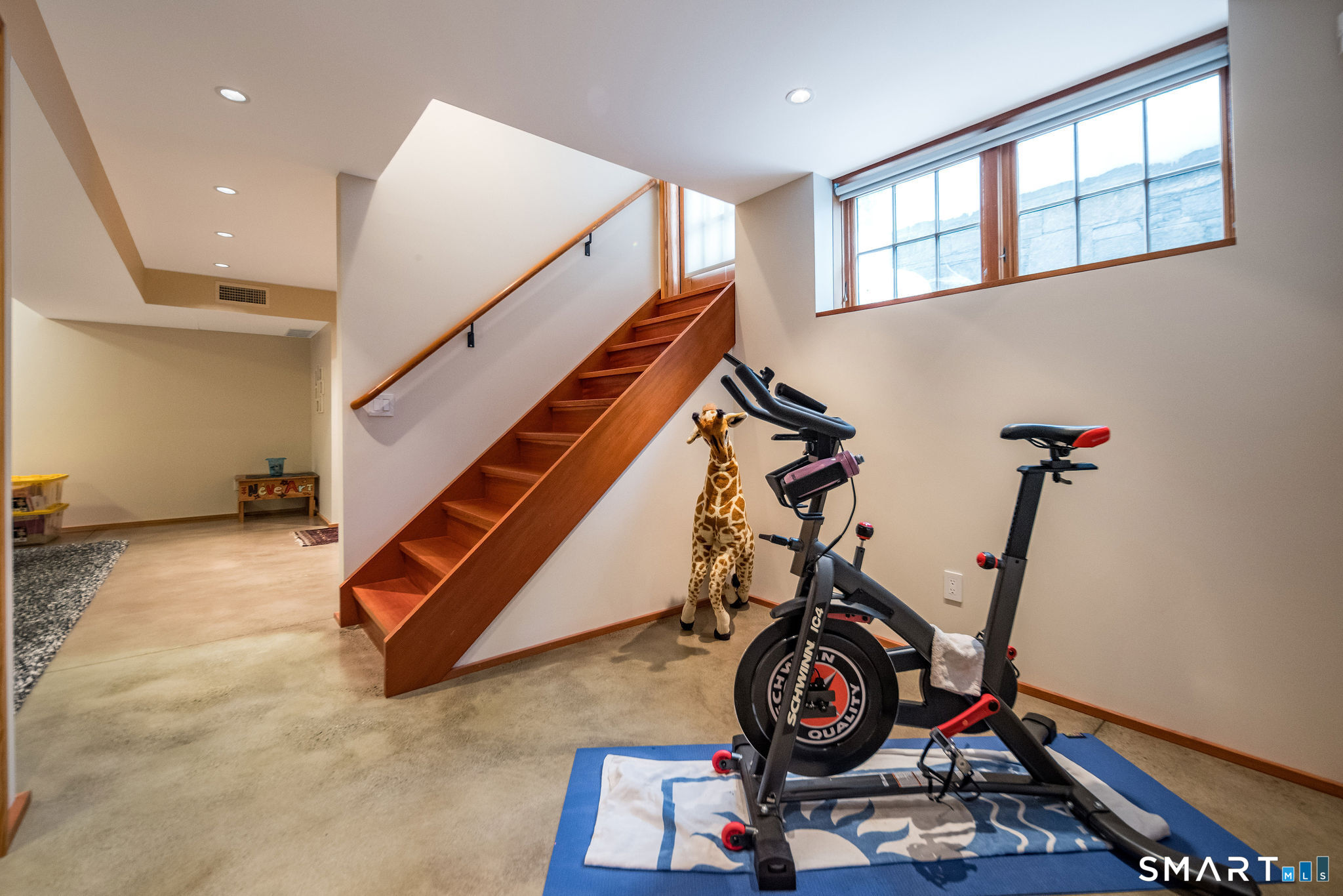 61 Hartford Avenue Madison, CT 06443 - Photo 72 of 75 a view of an entryway with wooden floor