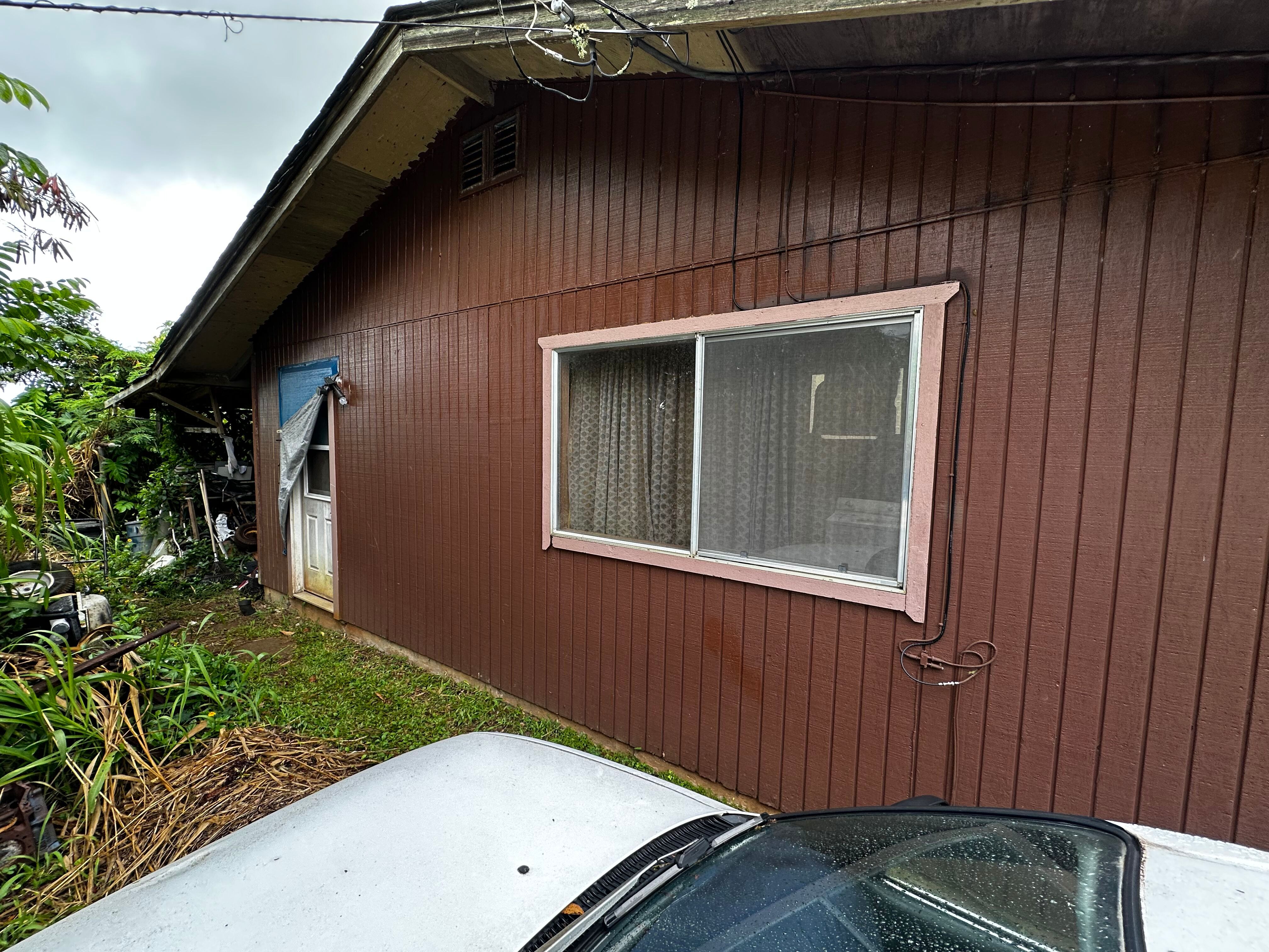 4373 Upa Road Koloa, HI 96756 - Photo 6 of 19 a view of outdoor space and front view of a house