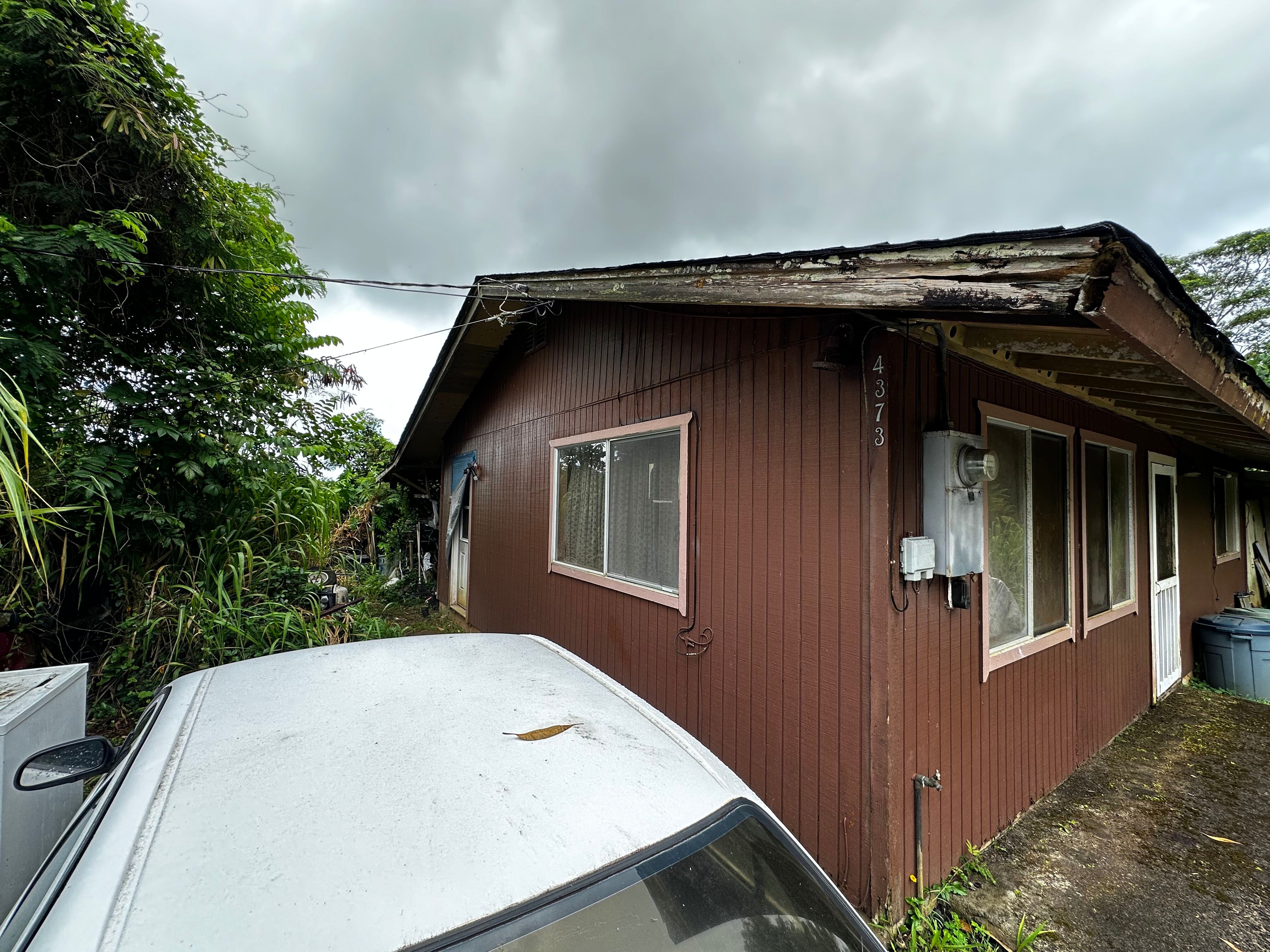 4373 Upa Road Koloa, HI 96756 - Photo 7 of 19 a view of a house with a backyard