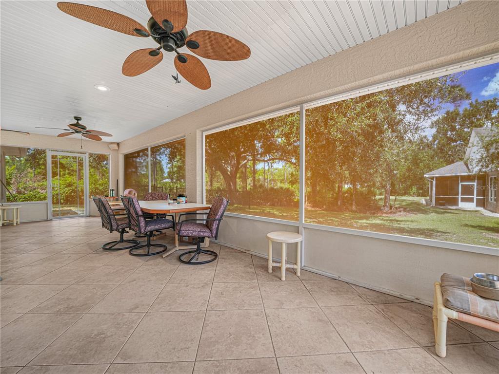 5001 Lakewood Road Sebring, FL 33875 - Photo 19 of 28 a view of a dining room with furniture window and outside view
