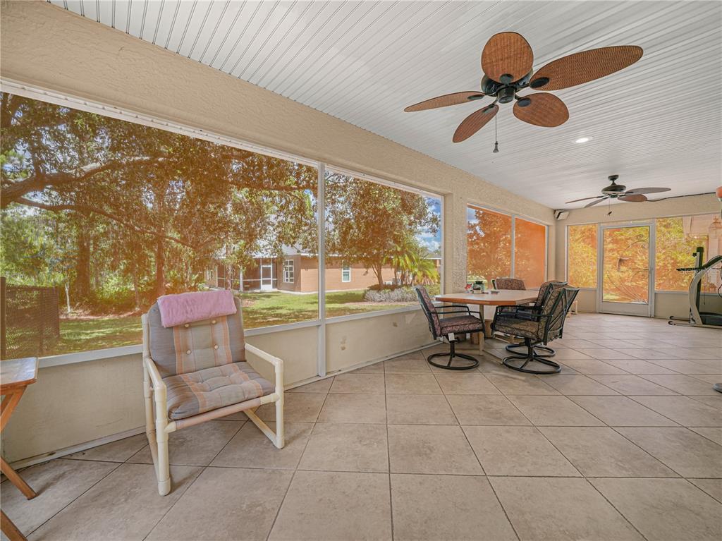 5001 Lakewood Road Sebring, FL 33875 - Photo 20 of 28 a view of a dining room with furniture window and outside view