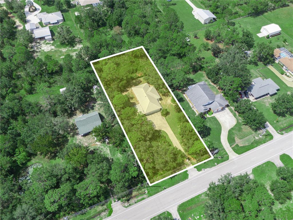 5001 Lakewood Road Sebring, FL 33875 - Photo 28 of 28 an aerial view of a house