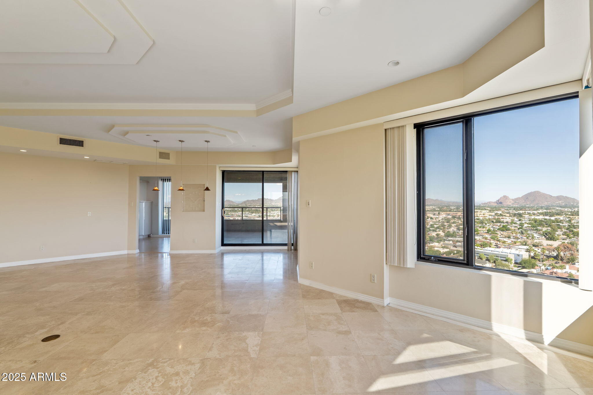 1040 East Osborn Road, Unit 1602 Phoenix, AZ 85014 - Photo 17 of 66 wooden floor in an empty room with a window