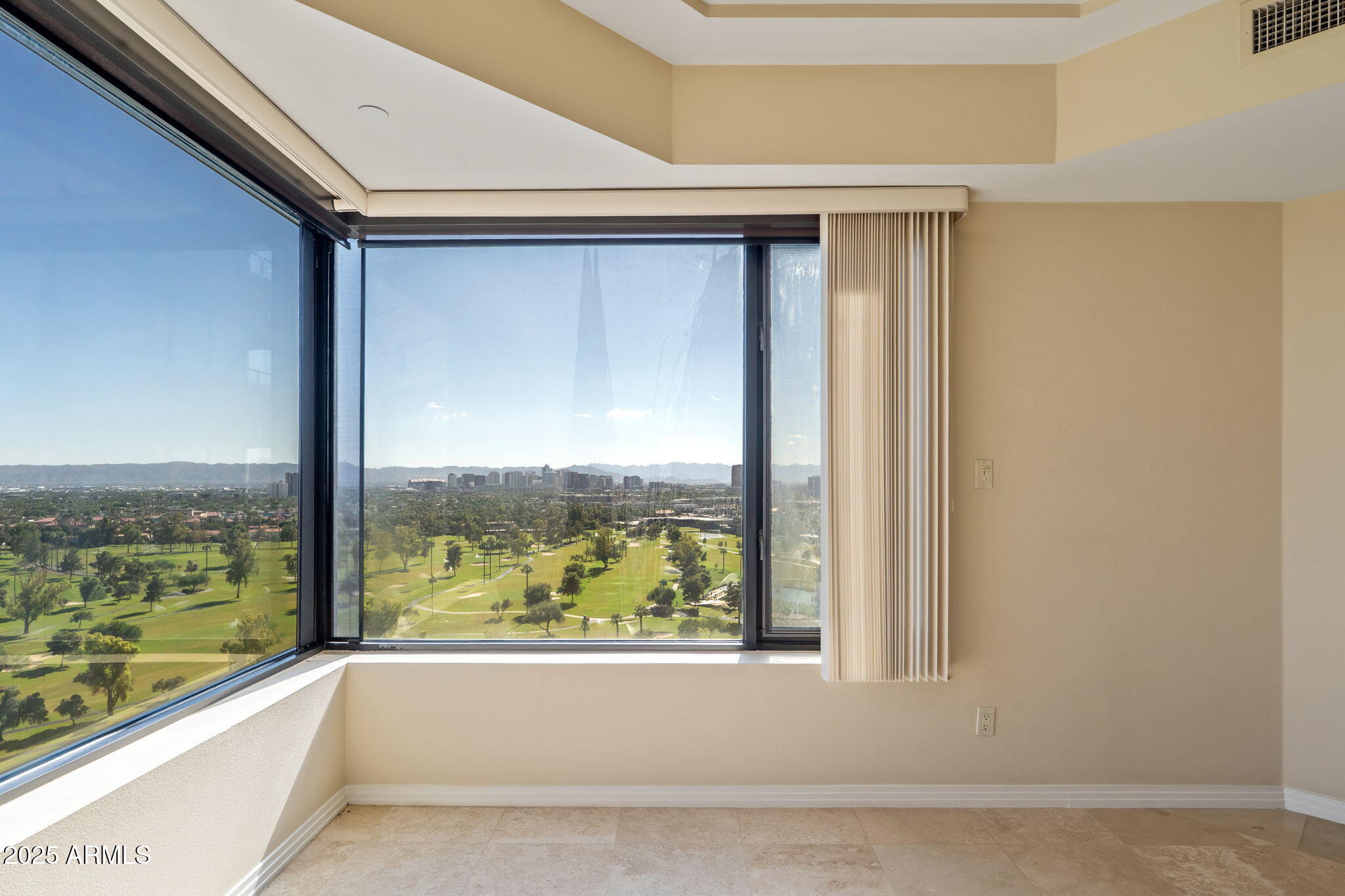 1040 East Osborn Road, Unit 1602 Phoenix, AZ 85014 - Photo 18 of 66 a view of a glass door with a balcony from a bed