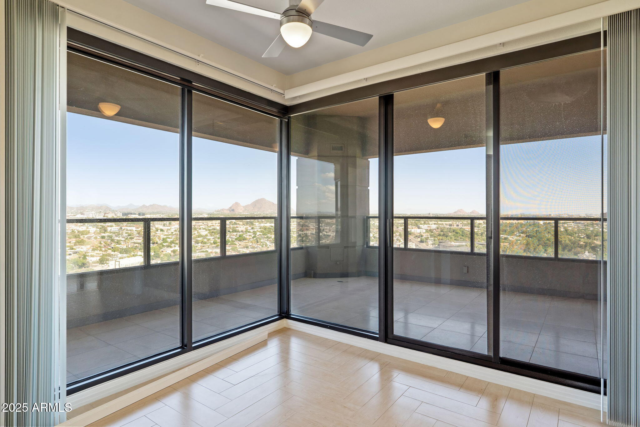 1040 East Osborn Road, Unit 1602 Phoenix, AZ 85014 - Photo 22 of 66 a view of an empty room and window