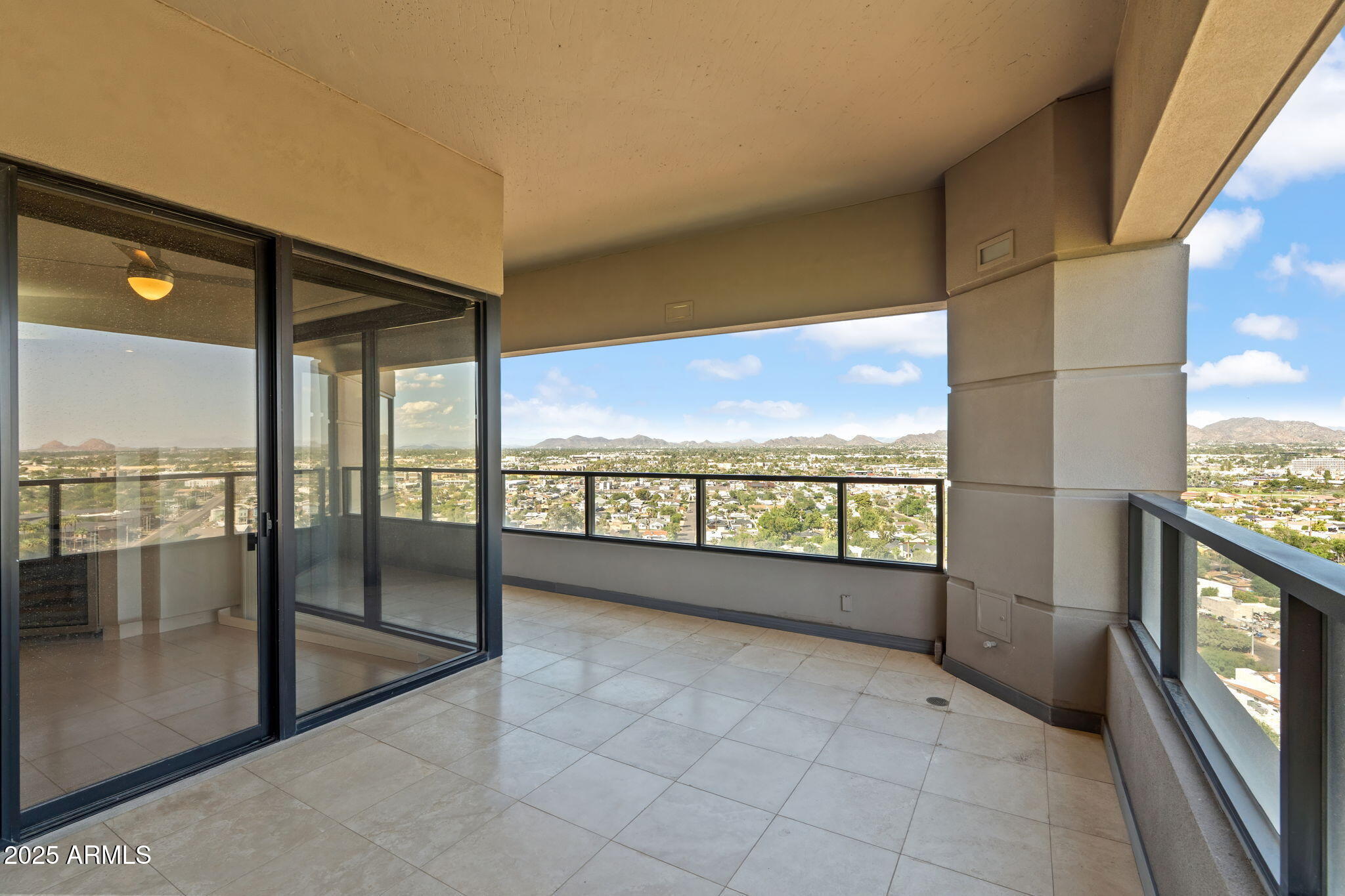 1040 East Osborn Road, Unit 1602 Phoenix, AZ 85014 - Photo 23 of 66 a view of an entryway with a floor to ceiling window