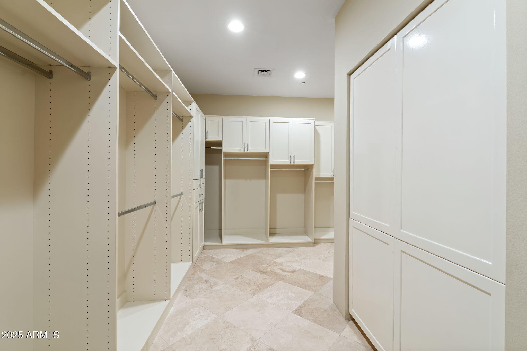 1040 East Osborn Road, Unit 1602 Phoenix, AZ 85014 - Photo 37 of 66 a view of entryway with white walls and cabinet
