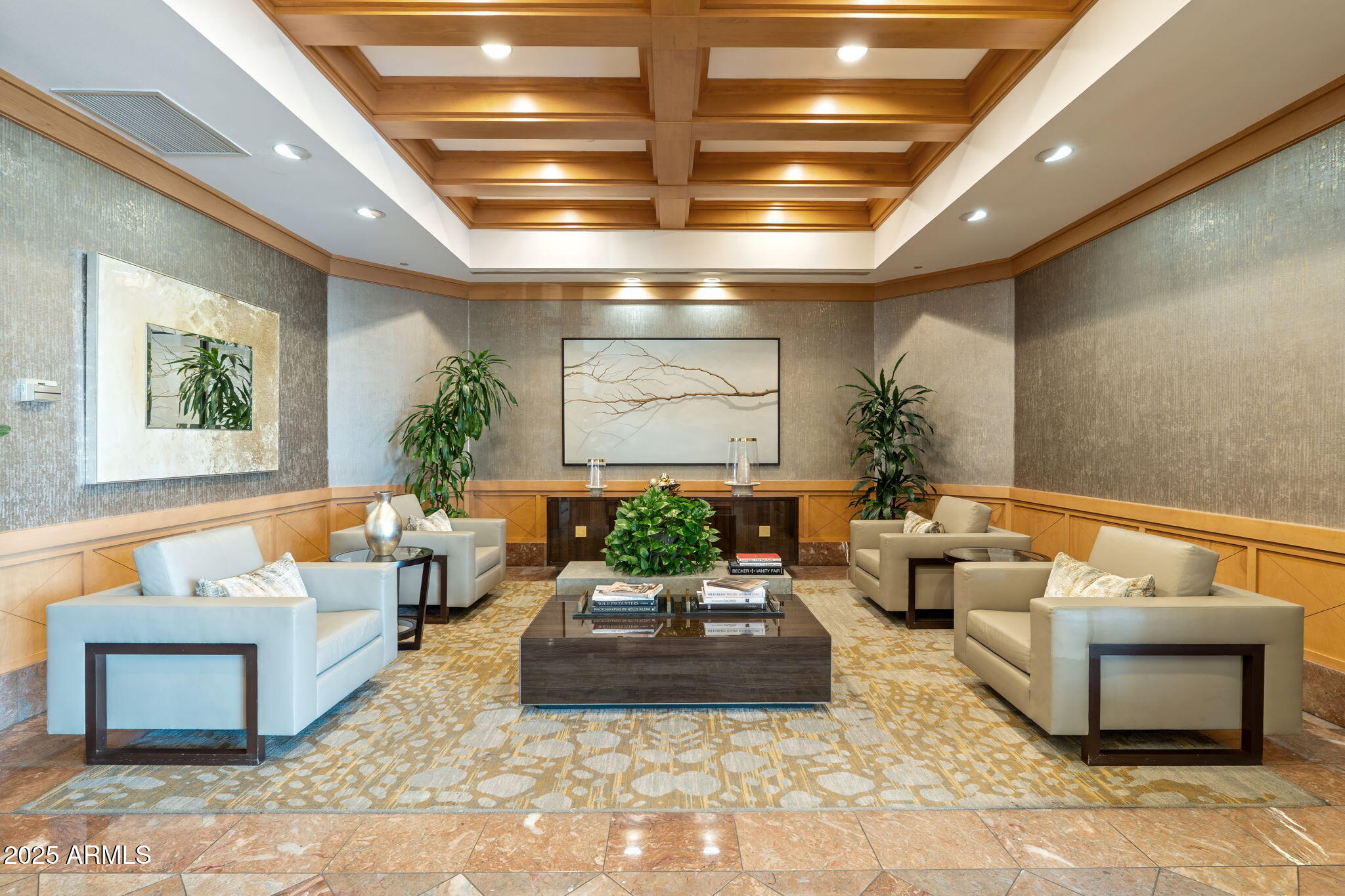 1040 East Osborn Road, Unit 1602 Phoenix, AZ 85014 - Photo 4 of 66 a living room with furniture and a potted plant