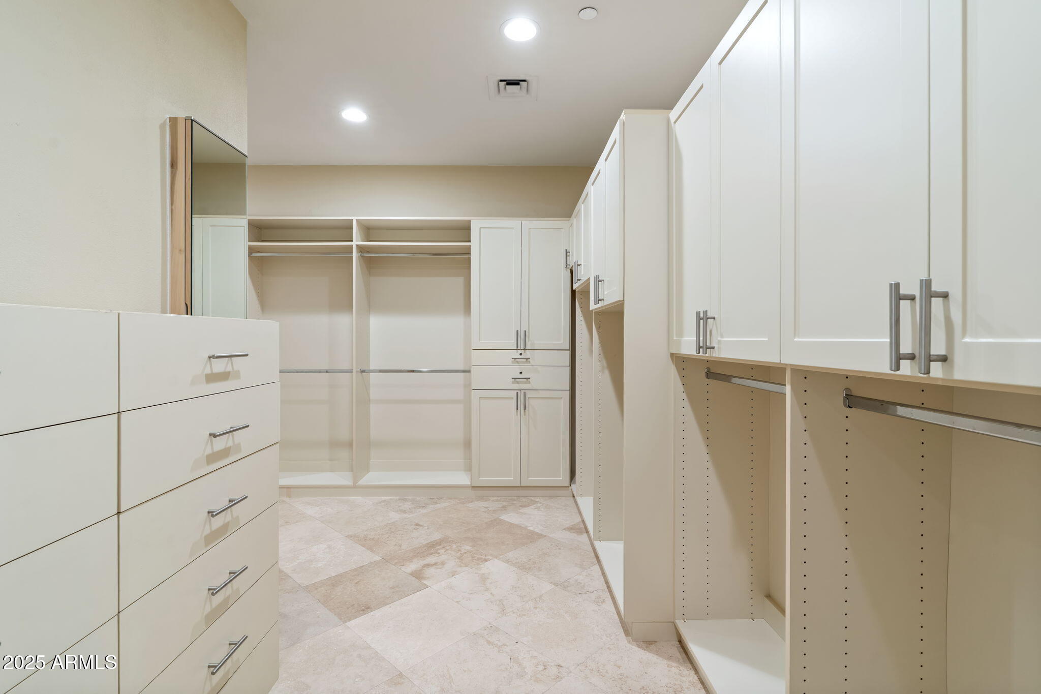 1040 East Osborn Road, Unit 1602 Phoenix, AZ 85014 - Photo 41 of 66 a view of walk in closet with empty racks