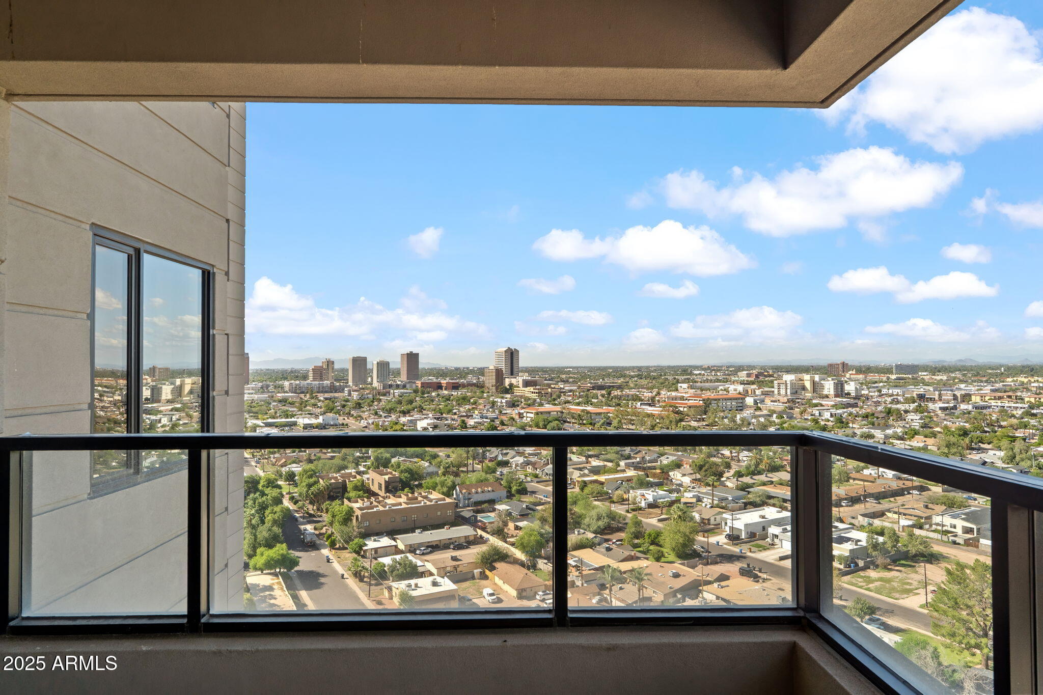 1040 East Osborn Road, Unit 1602 Phoenix, AZ 85014 - Photo 42 of 66 a view of city from a balcony