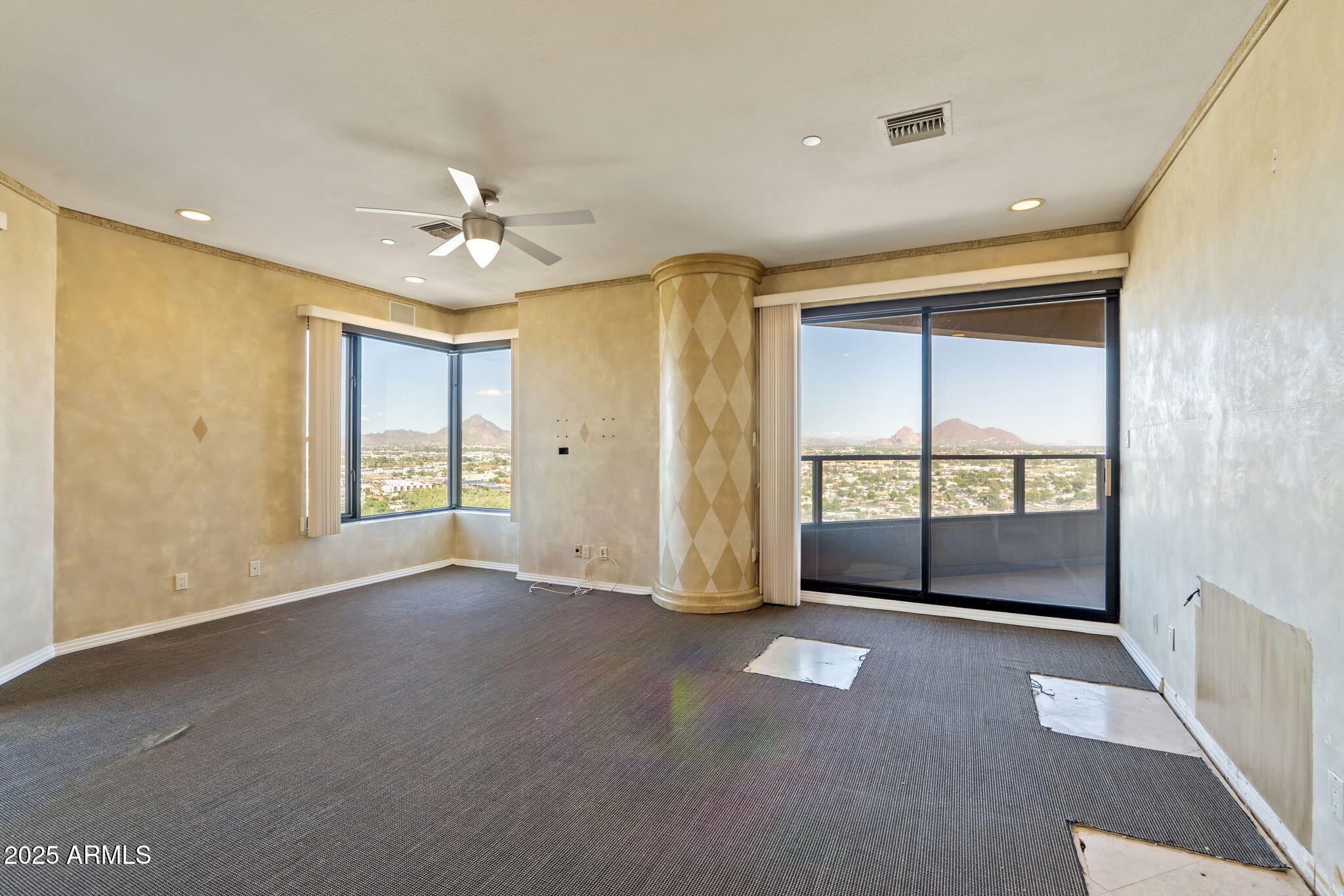 1040 East Osborn Road, Unit 1602 Phoenix, AZ 85014 - Photo 46 of 66 a view of an empty room with a window