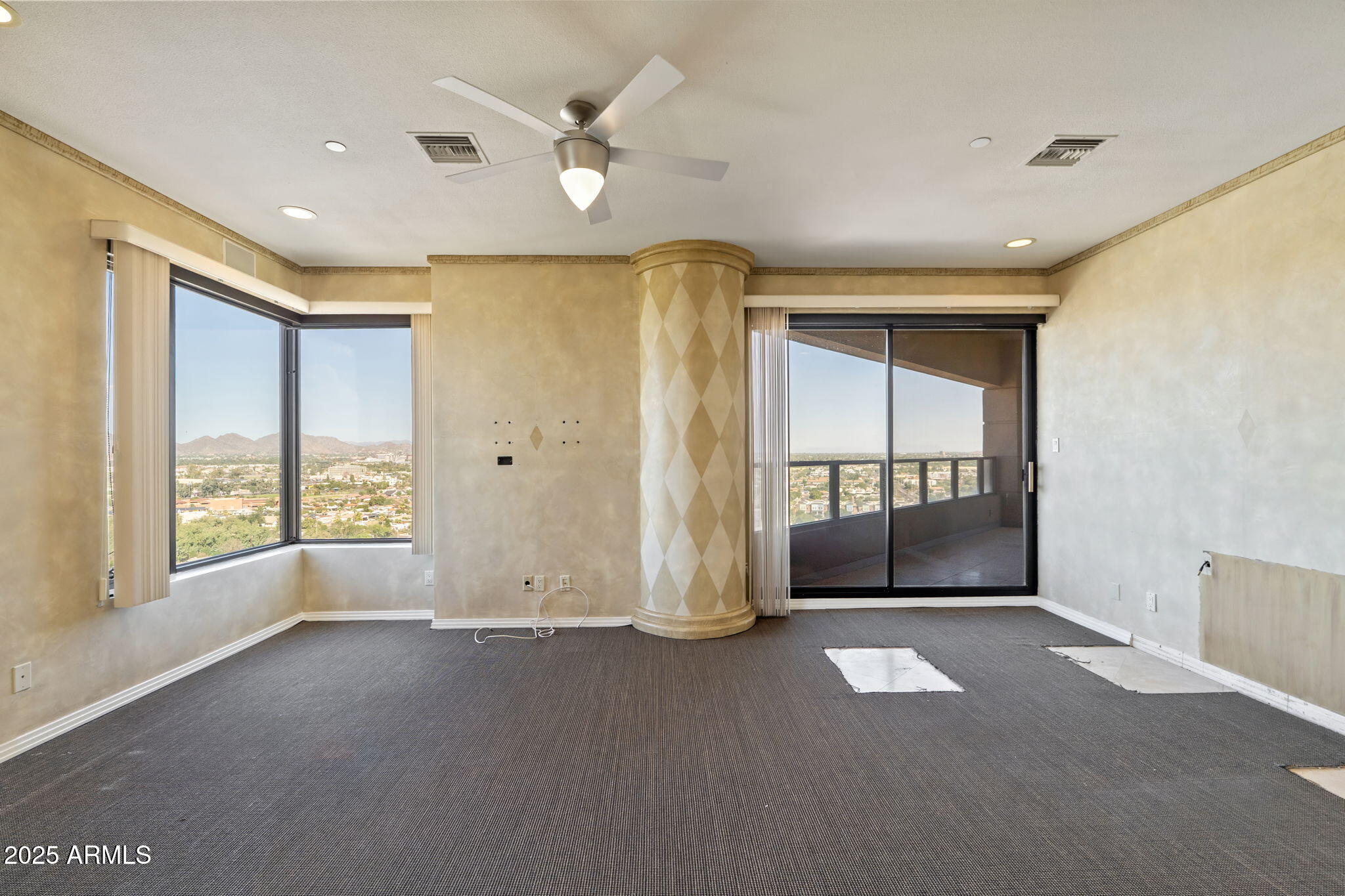 1040 East Osborn Road, Unit 1602 Phoenix, AZ 85014 - Photo 47 of 66 a view of livingroom with a ceiling fan and window