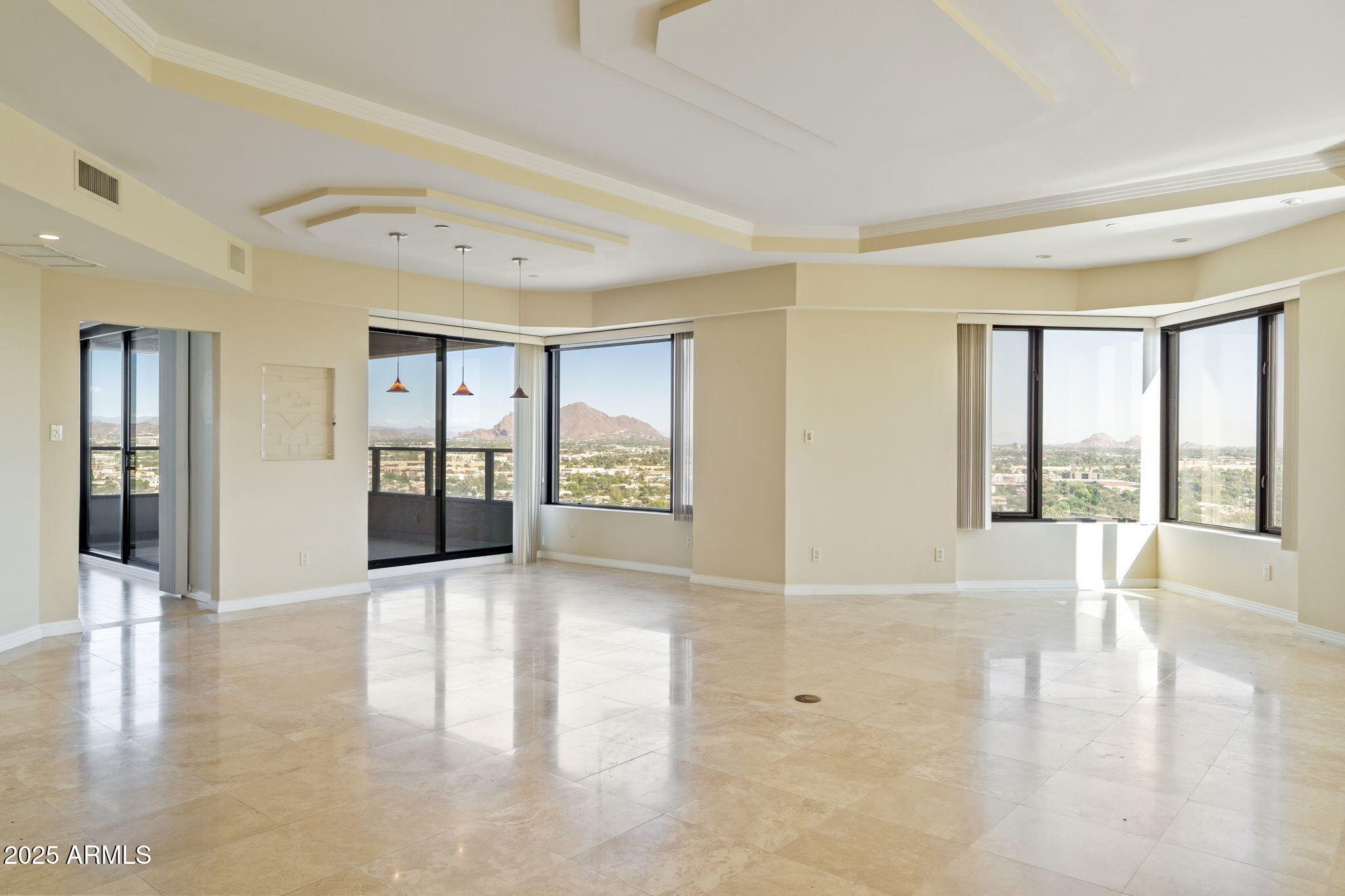 1040 East Osborn Road, Unit 1602 Phoenix, AZ 85014 - Photo 52 of 66 a view of an entryway with wooden floor