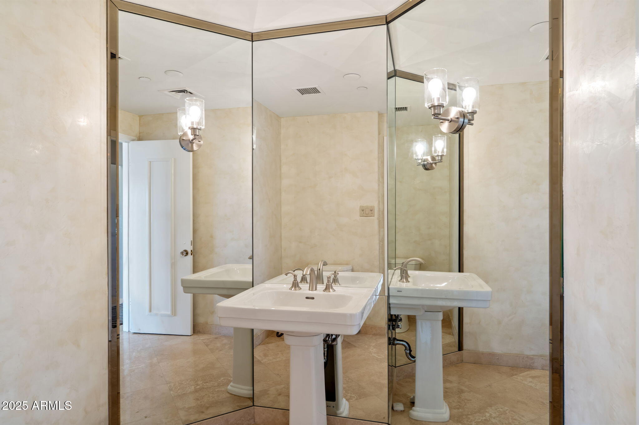 1040 East Osborn Road, Unit 1602 Phoenix, AZ 85014 - Photo 60 of 66 a bathroom with a sink a toilet and shower