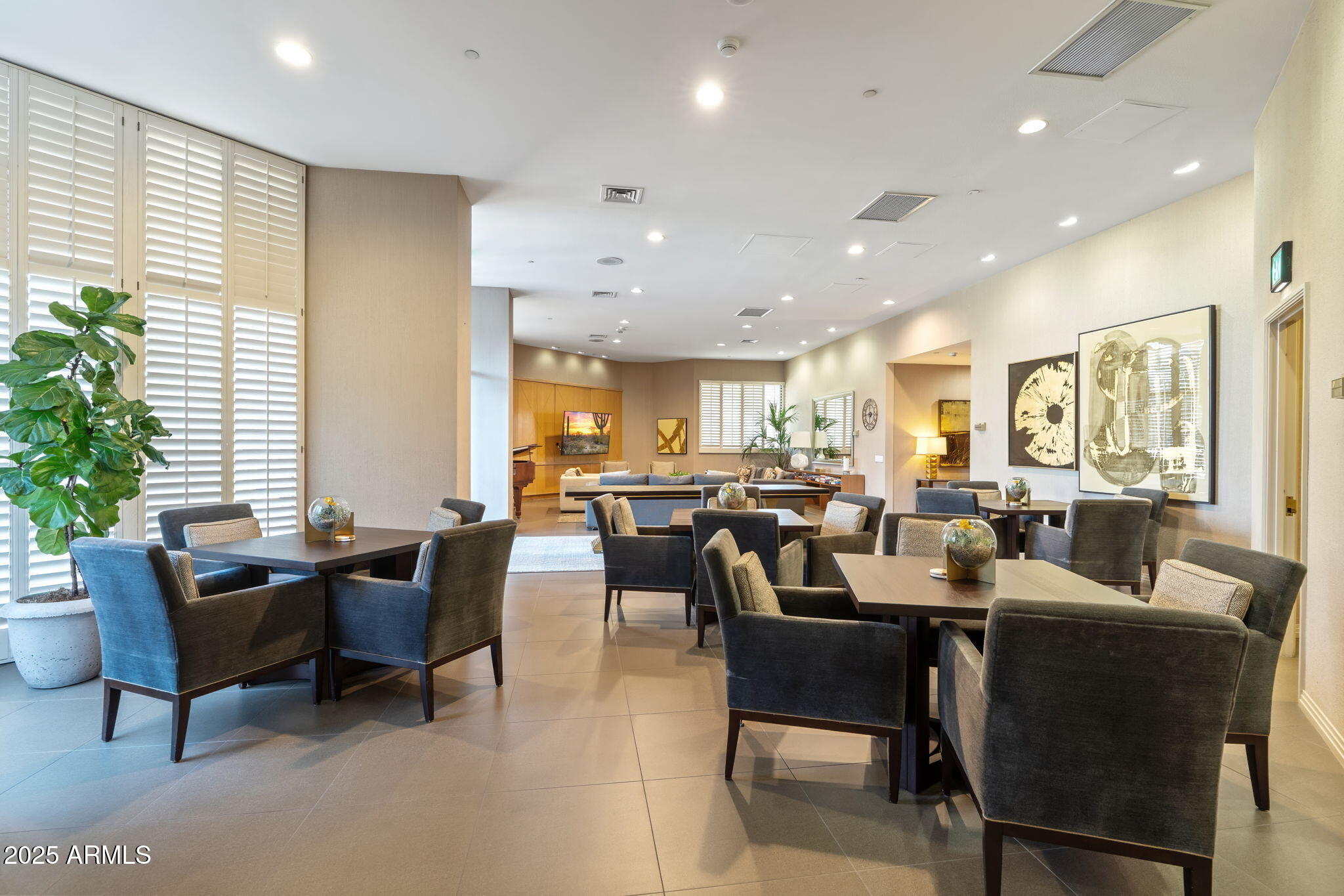 1040 East Osborn Road, Unit 1602 Phoenix, AZ 85014 - Photo 61 of 66 a view of a dining room with furniture