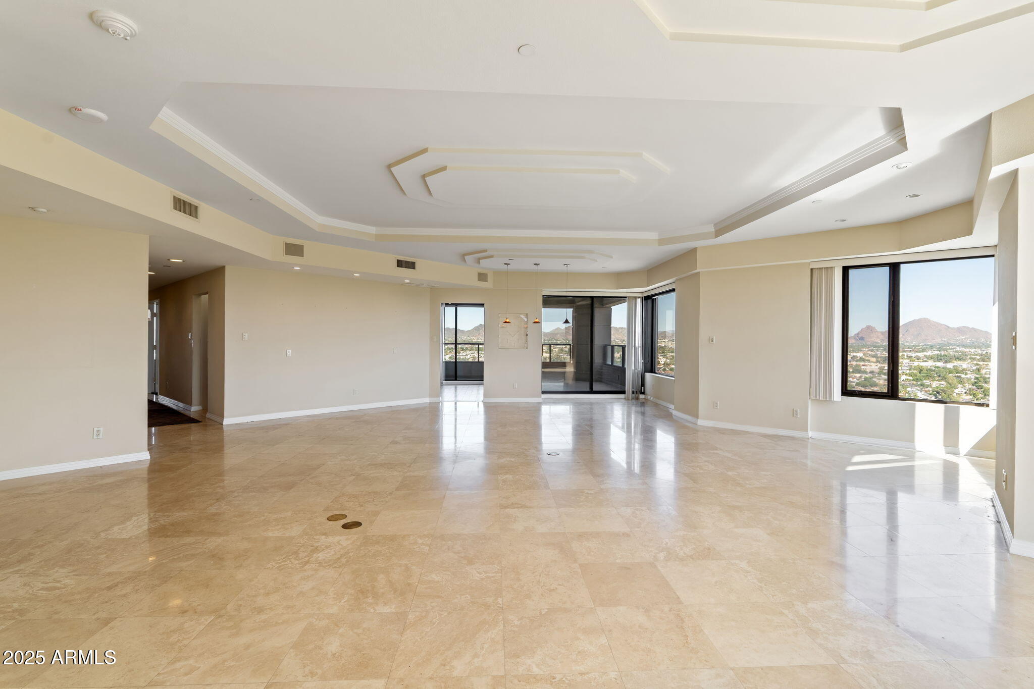 1040 East Osborn Road, Unit 1602 Phoenix, AZ 85014 - Photo 7 of 66 a view of an entryway with wooden floor