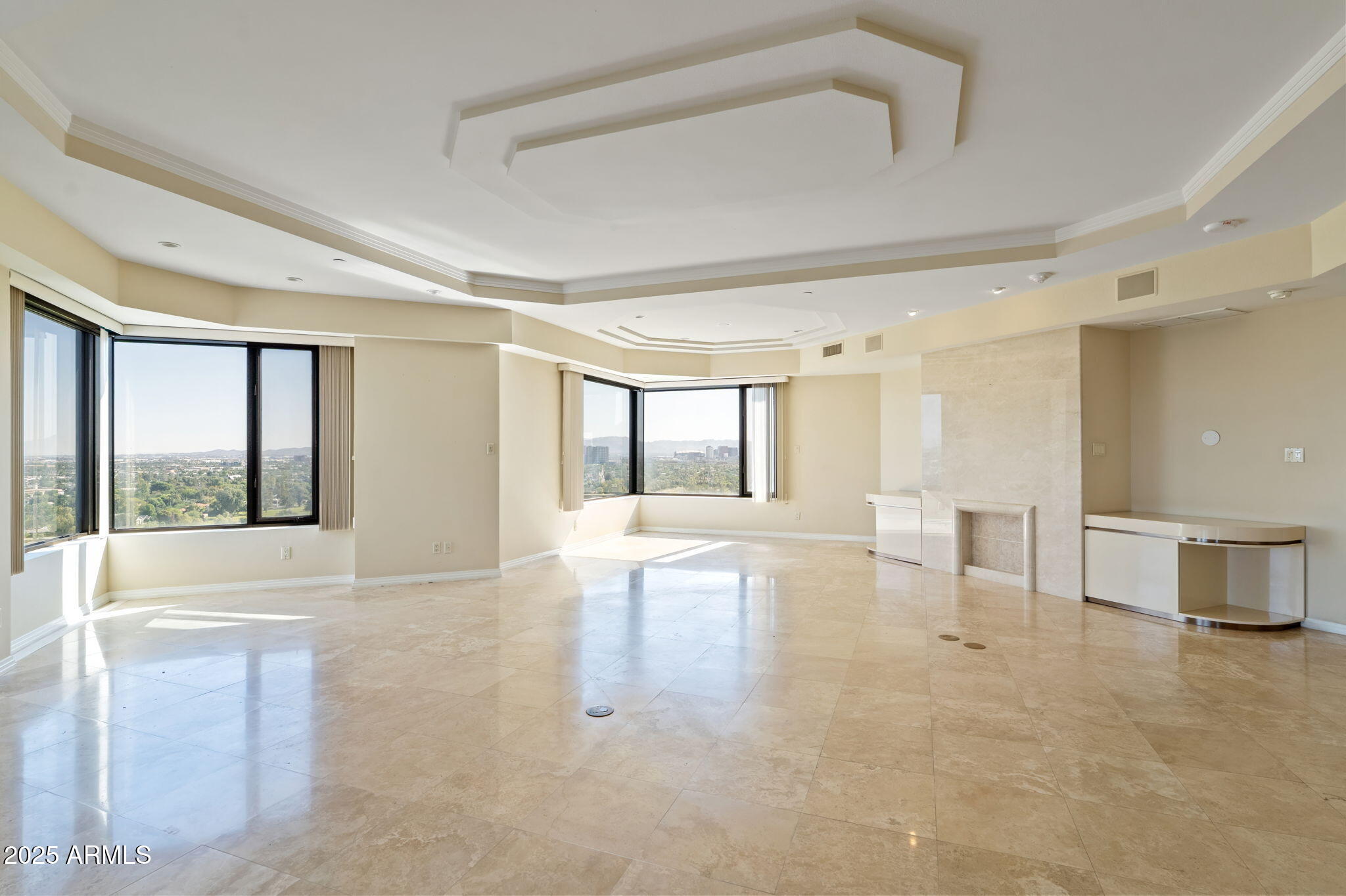 1040 East Osborn Road, Unit 1602 Phoenix, AZ 85014 - Photo 9 of 66 a living room with furniture and a large window