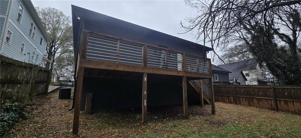 762 Cooper Street Southwest Atlanta, GA 30315 - Photo 39 of 43 a front view of a house with a yard
