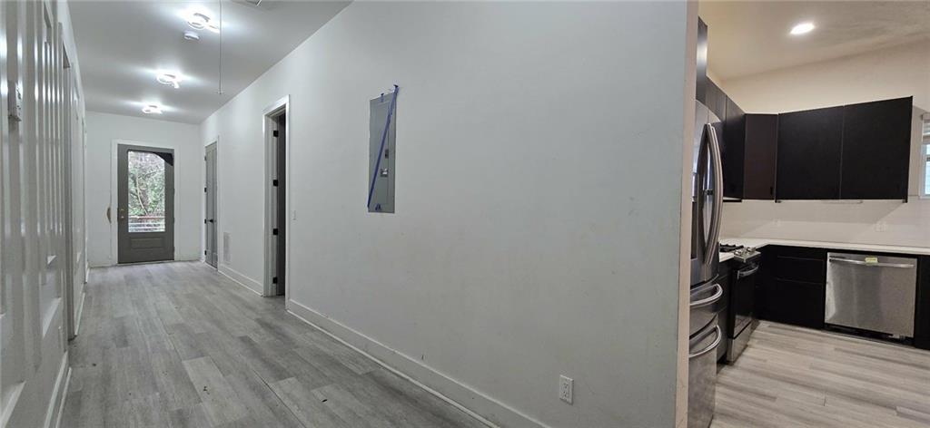 762 Cooper Street Southwest Atlanta, GA 30315 - Photo 9 of 43 a view of a kitchen from the hallway
