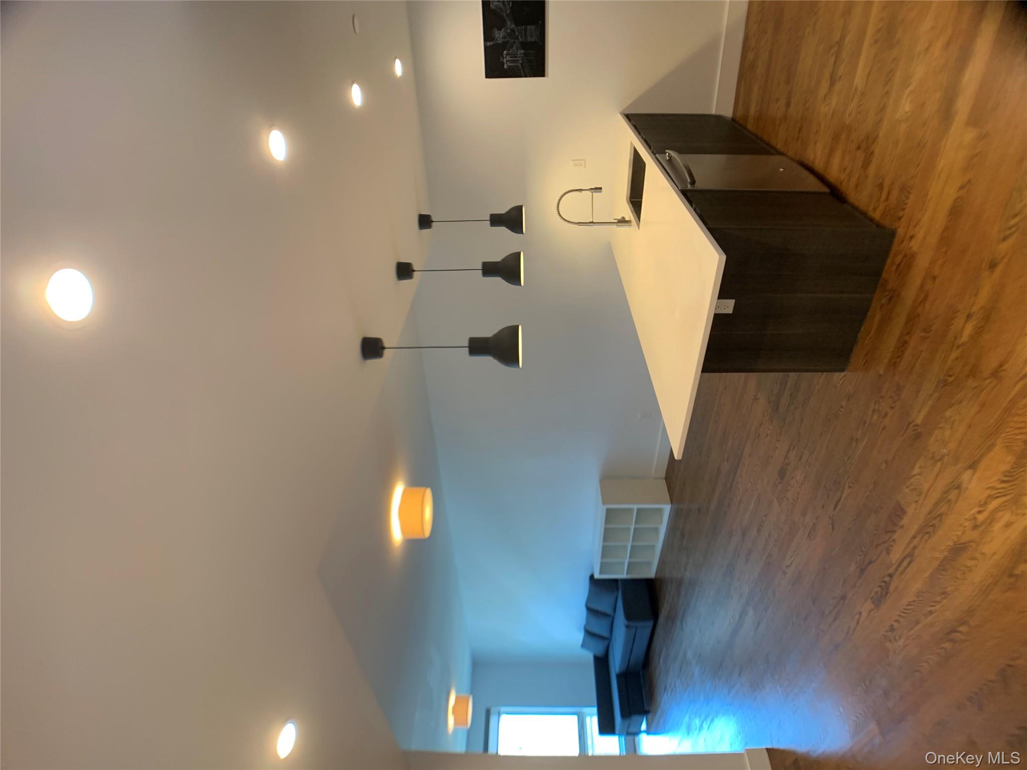 109-19 72nd Road, Unit 4C Queens, NY 11375 - Photo 7 of 16 a large room with pool table and couch