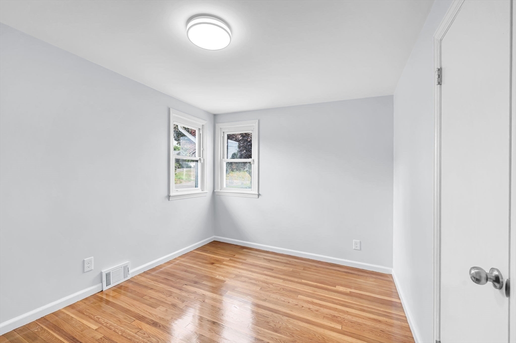 13 Lorimer Street Chicopee, MA 01013 - Photo 19 of 42 an empty room with a window