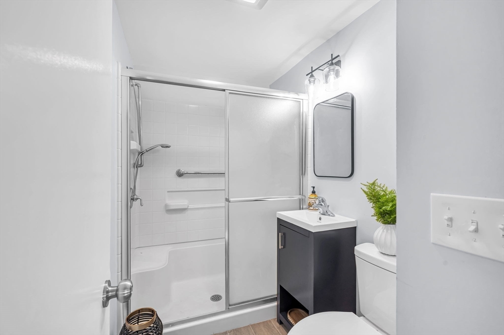 13 Lorimer Street Chicopee, MA 01013 - Photo 22 of 42 a bathroom with a sink toilet and shower