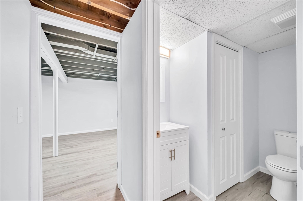 13 Lorimer Street Chicopee, MA 01013 - Photo 33 of 42 a bathroom with a toilet and a shower
