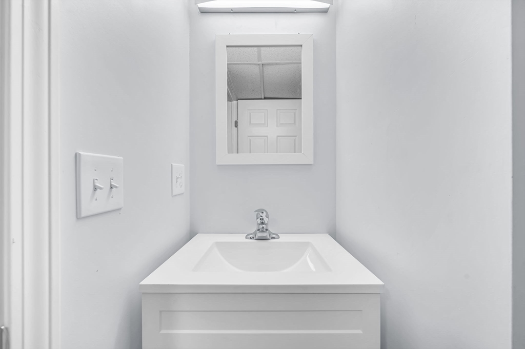 13 Lorimer Street Chicopee, MA 01013 - Photo 35 of 42 a close view of a sink in a bathroom