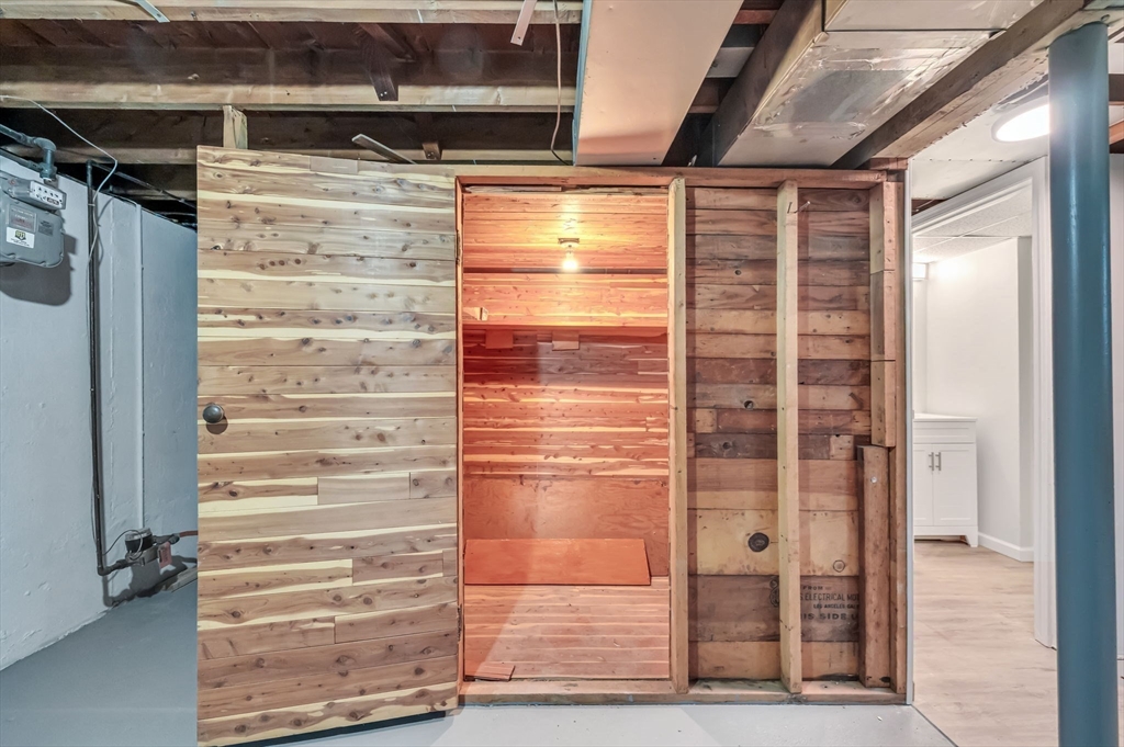 13 Lorimer Street Chicopee, MA 01013 - Photo 36 of 42 a view of walk in closet with empty racks