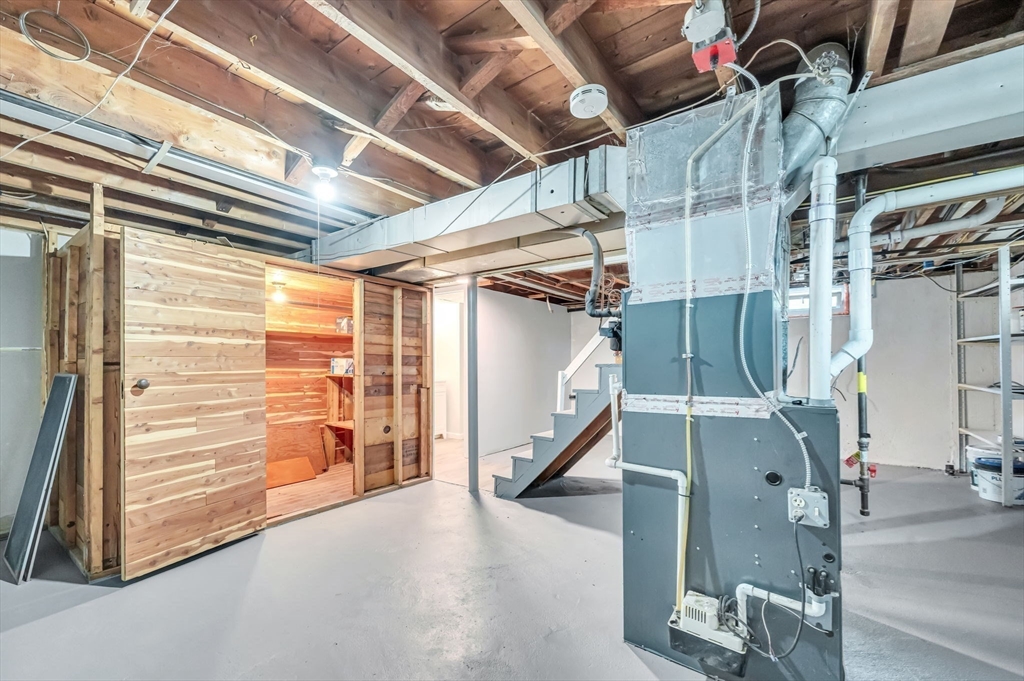 13 Lorimer Street Chicopee, MA 01013 - Photo 37 of 42 a view of a room with wooden floor