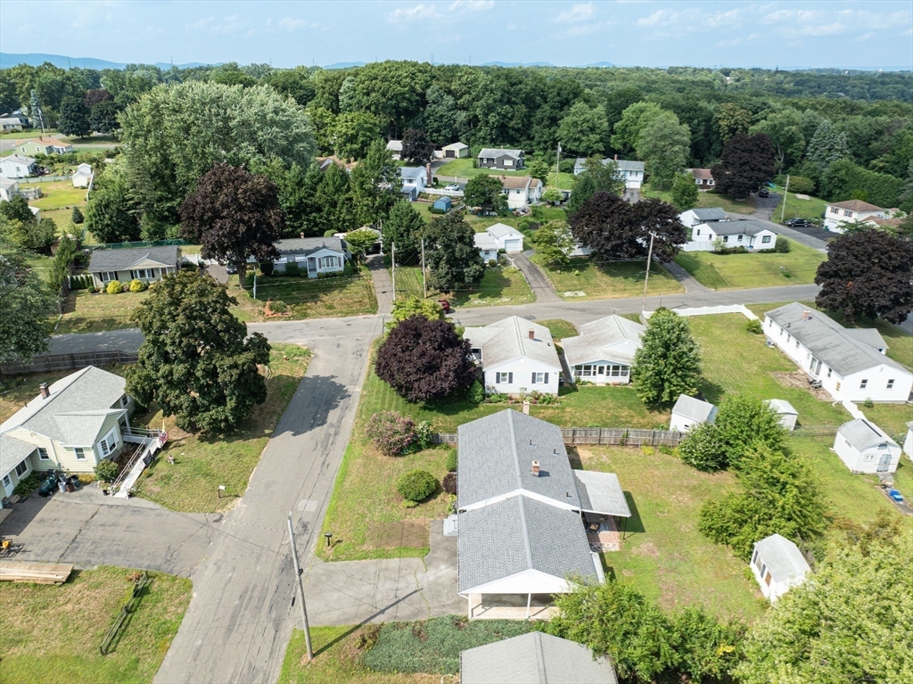 13 Lorimer Street Chicopee, MA 01013 - Photo 39 of 42 an aerial view of a house with swimming pool patio and lake view