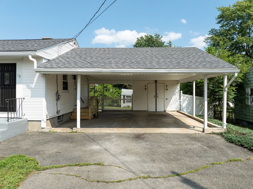 13 Lorimer Street Chicopee, MA 01013 - Photo 4 of 42 a view of a house with porch and garden