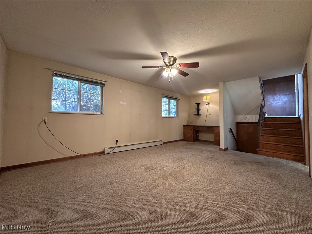 2829 Shellhart Road Barberton, OH 44203 - Photo 16 of 29 Lower-level living space with natural light and built-in desk