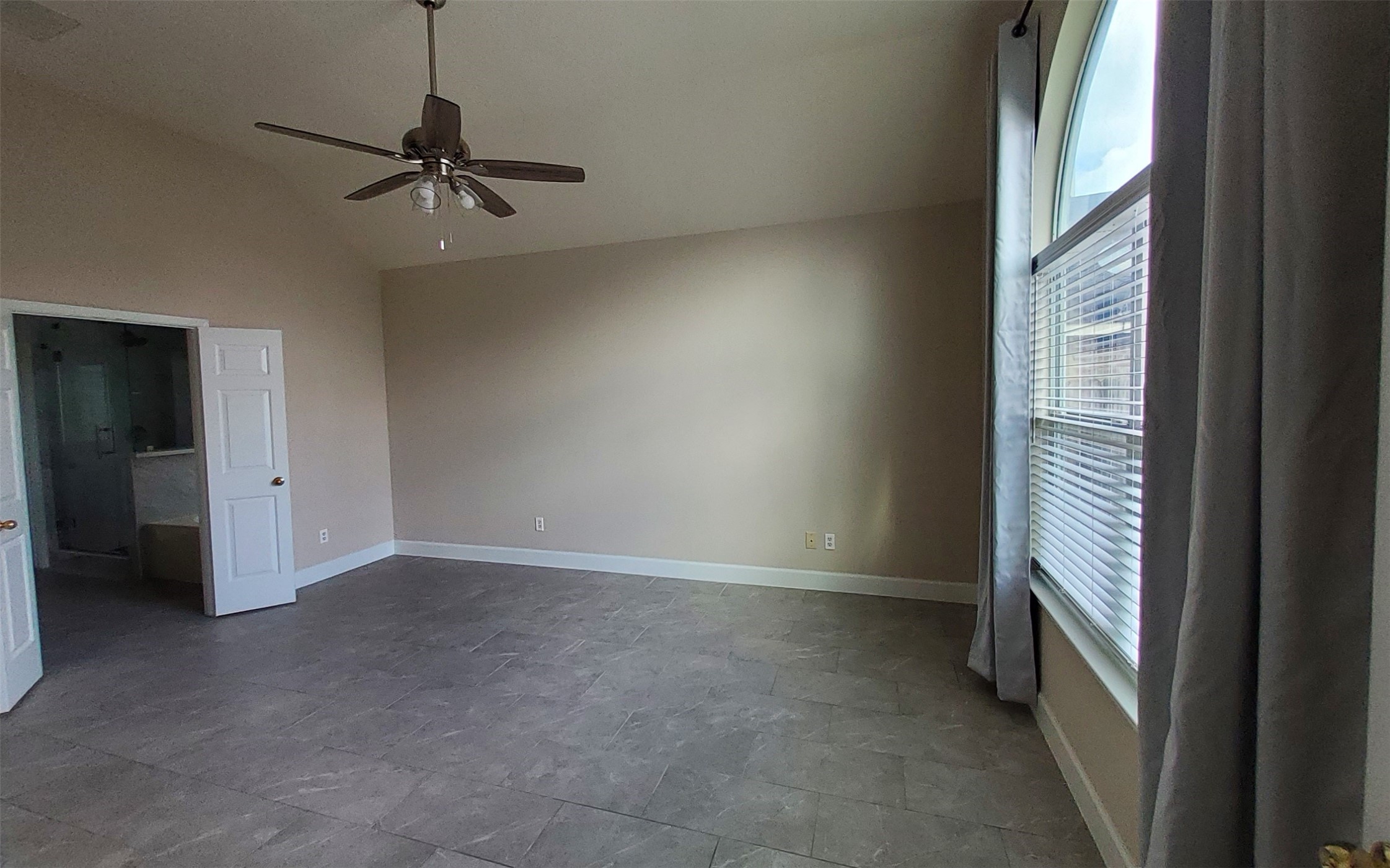 2906 Humble Drive Manvel, TX 77578 - Photo 14 of 34 a view of an empty room with a window