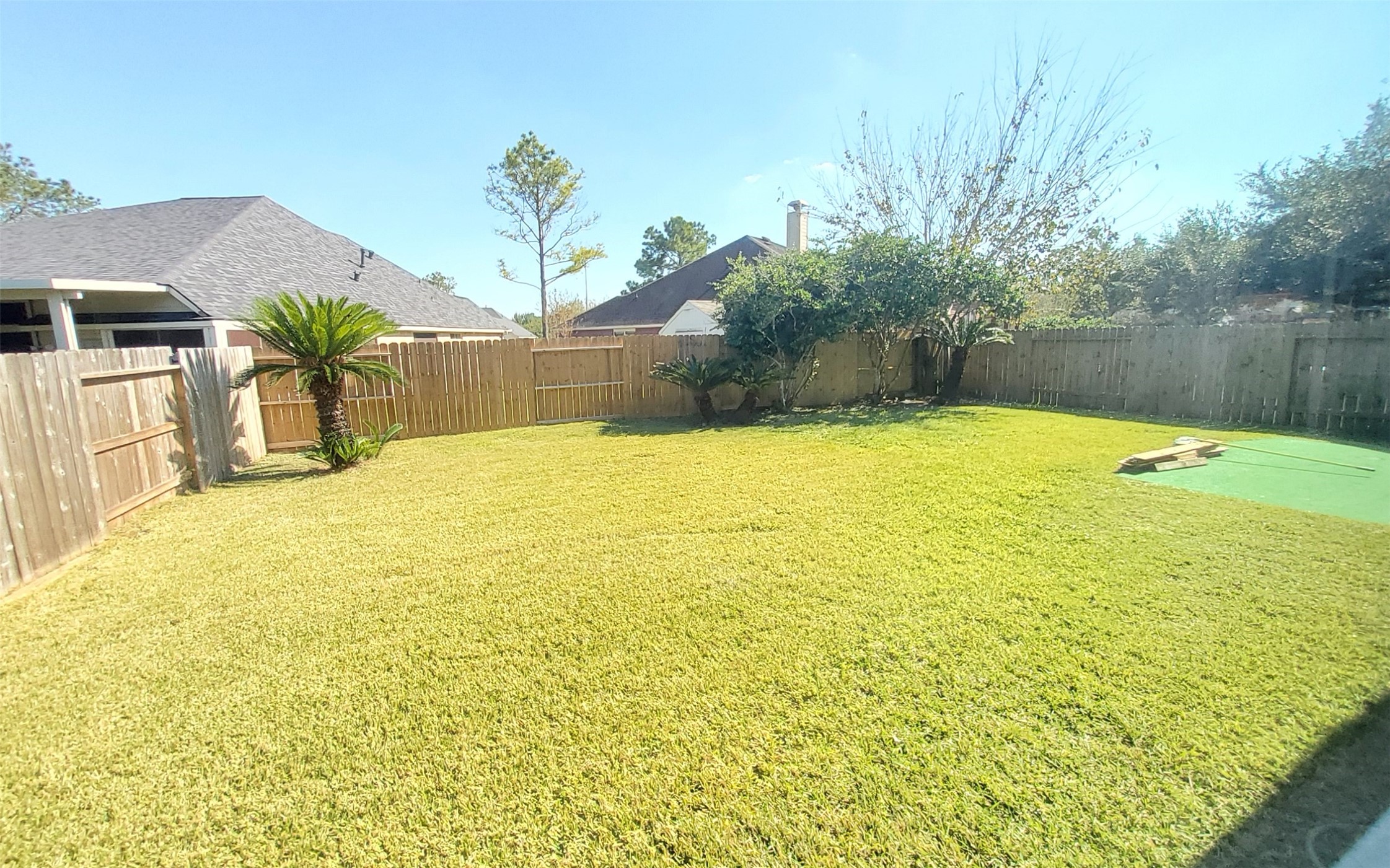 2906 Humble Drive Manvel, TX 77578 - Photo 20 of 34 a view of a swimming pool and an outdoor space