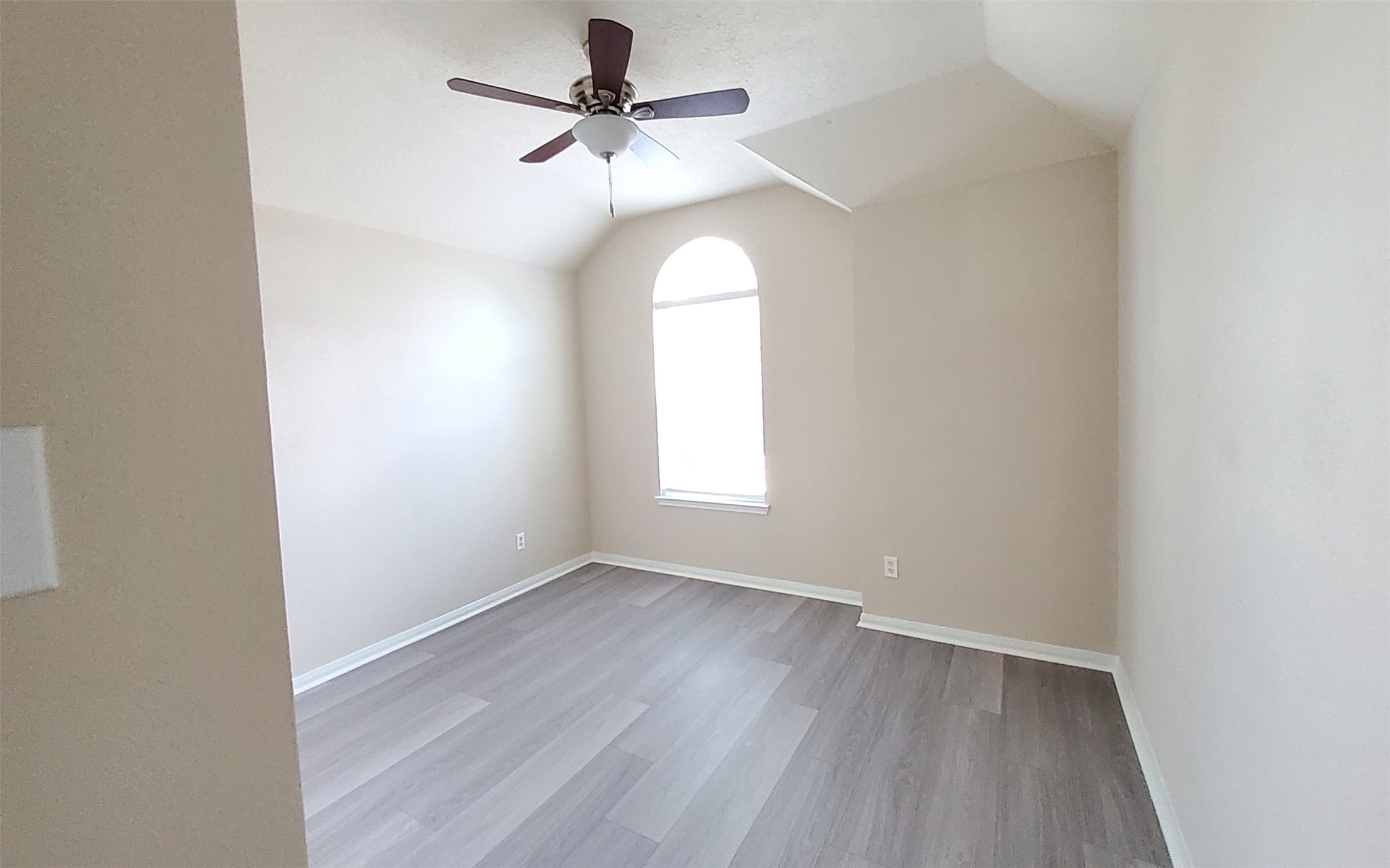 2906 Humble Drive Manvel, TX 77578 - Photo 25 of 34 wooden floor in an empty room with a window