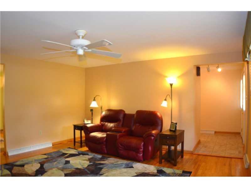 307 Foxcroft Road Pittsburgh, PA 15220 - Photo 2 of 23 Living Room. LIGHT AND BRIGHT WITH OAK HARDWOOD FLOORS AND FRONT WINDOWS.