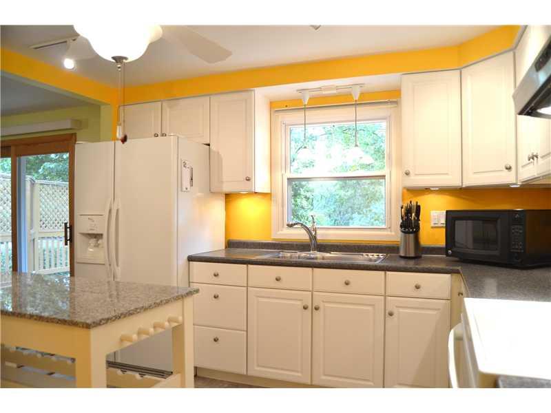 307 Foxcroft Road Pittsburgh, PA 15220 - Photo 4 of 23 Kitchen. Updated kicthen with movable island and under cabinet lighting.