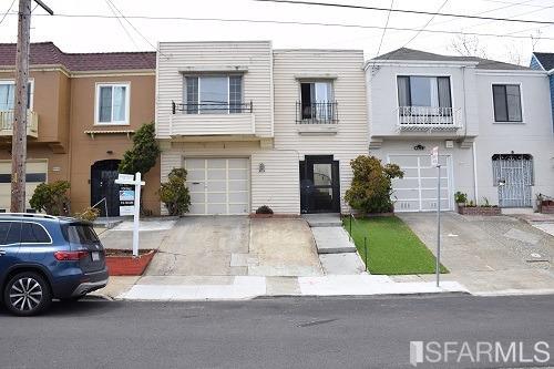 1026 Girard Street San Francisco, CA 94134 - Photo 1 of 15 a couple of cars parked in front of a house