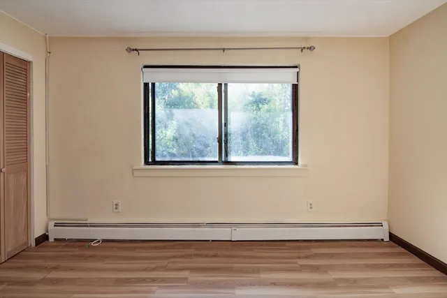 a view of a room that has a window