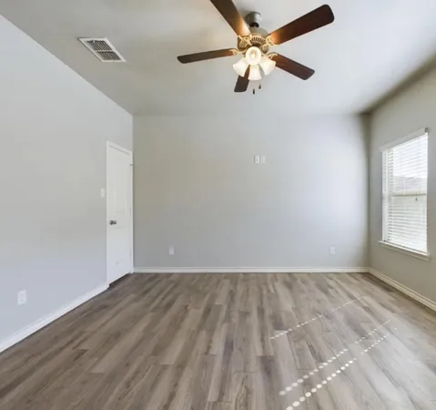 a view of entryway with wooden floor and stairs