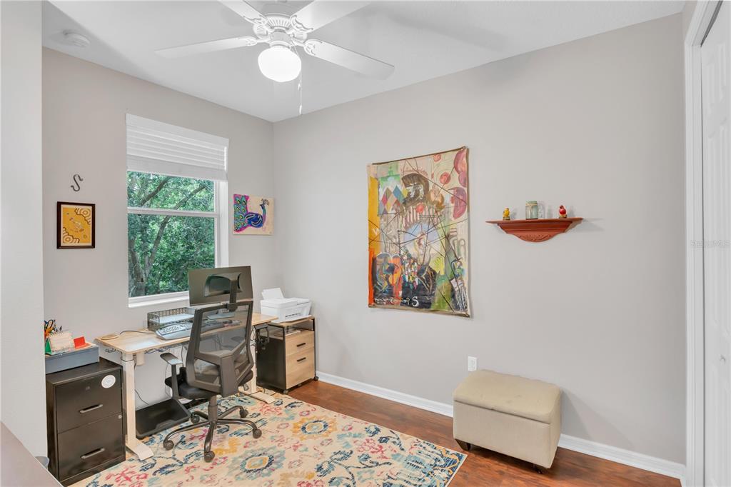 306 Reed Grass Drive Oviedo, FL 32765 - Photo 18 of 33 a workspace with furniture and window