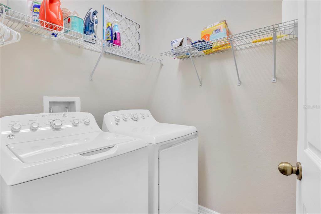 306 Reed Grass Drive Oviedo, FL 32765 - Photo 21 of 33 a utility room with dryer and washer