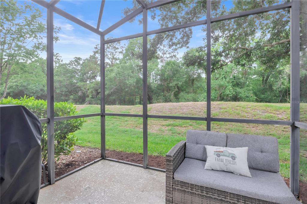 306 Reed Grass Drive Oviedo, FL 32765 - Photo 26 of 33 a roof deck with a yard