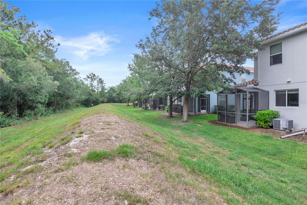 306 Reed Grass Drive Oviedo, FL 32765 - Photo 28 of 33 a view of a house with a yard