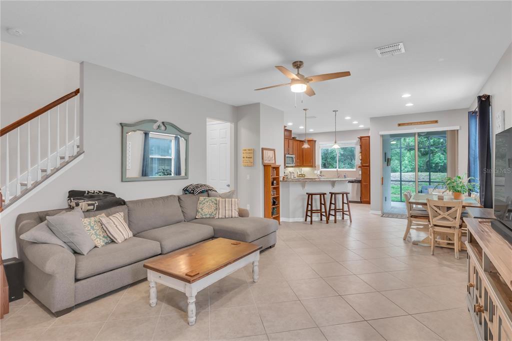 306 Reed Grass Drive Oviedo, FL 32765 - Photo 4 of 33 a living room with furniture and a large window