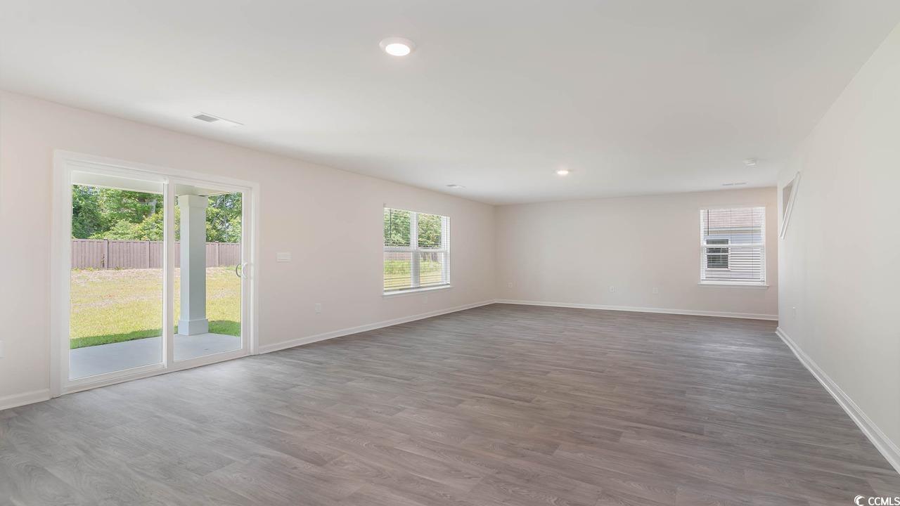 322 Acosta Circle Conway, SC 29527 - Photo 11 of 27 Unfurnished room with wood-type flooring