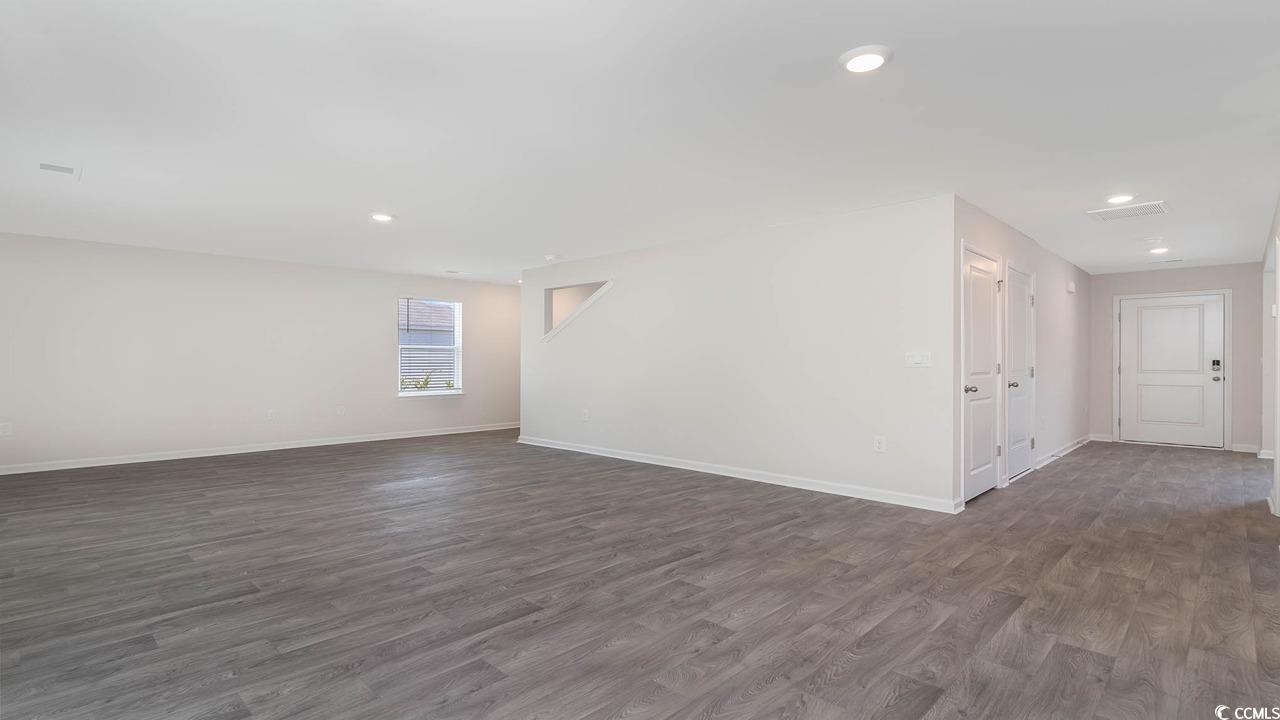 322 Acosta Circle Conway, SC 29527 - Photo 12 of 27 Spare room featuring dark hardwood / wood-style fl
