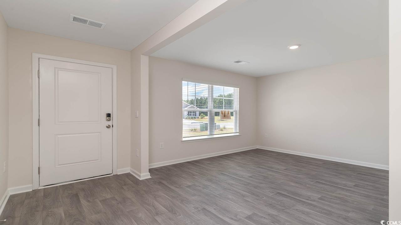 322 Acosta Circle Conway, SC 29527 - Photo 2 of 27 Foyer entrance with dark wood-type flooring